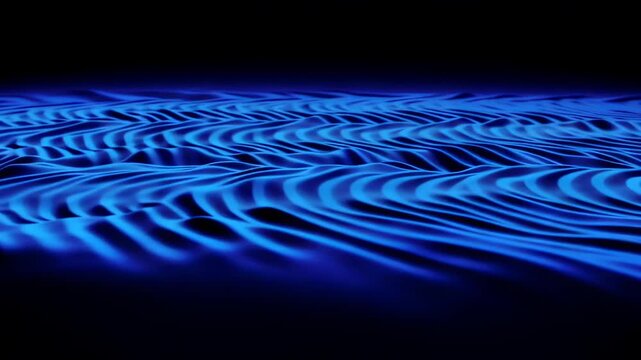 Blue illuminated waves create a mesmerizing pattern on a dark surface, showcasing the fluid motion and dynamic texture of water in a captivating visual display