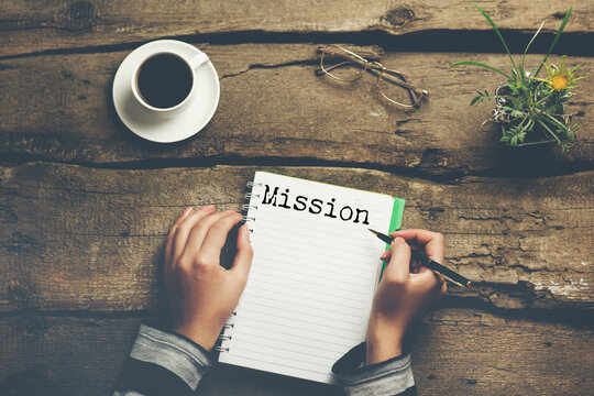 Torn paper with word Mission