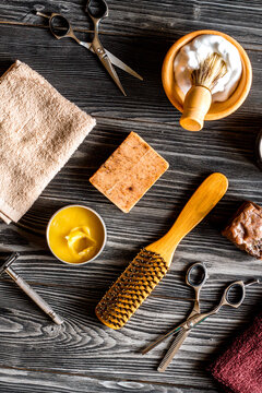 Tools for cutting beard barbershop top view on wooden background