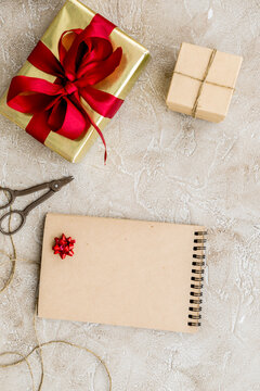 wrapping gifts in box for holiday top view mock up