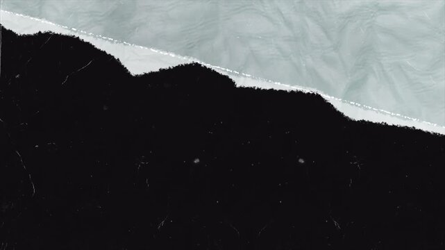 Abstract split screen transition with paper tear effect and paper texture.