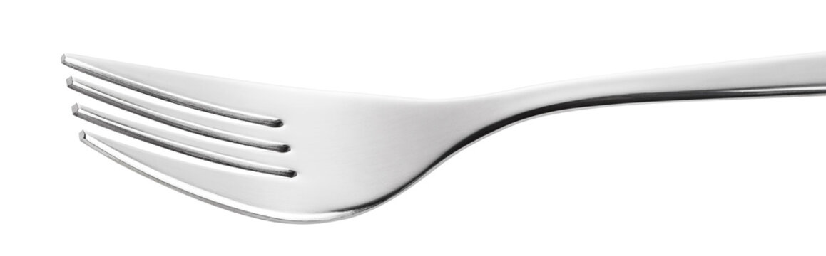 Stainless steel dinner fork close-up, isolated on transparent cutout background
