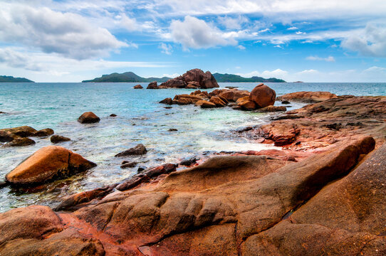 Ile St. Pierre With Granite Rocks And Turquoise Water In Seychelles