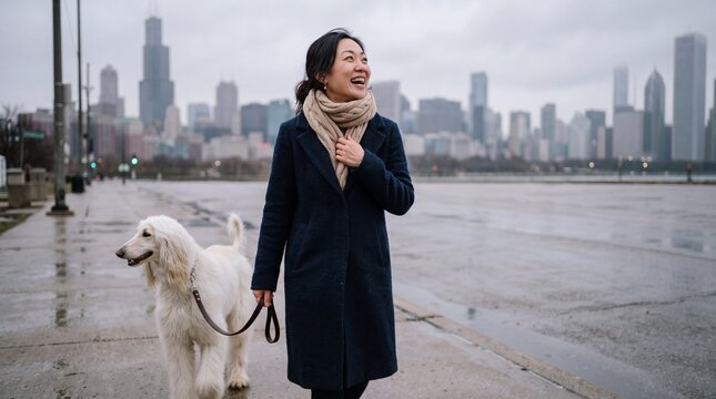 Smiling Asian Woman Walking Large White Dog with City Skyline