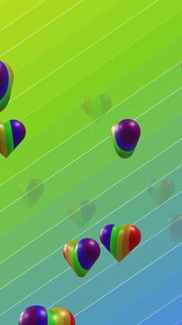 Animation of rainbow hearts moving on colorful background