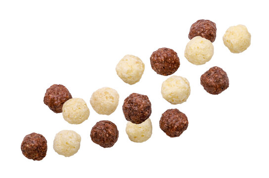 Sweet cereal balls flying on a white. Isolated