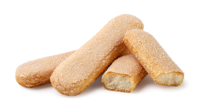 Savoiardi cookies and halves close-up on a white. Isolated