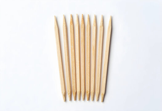 Dental hygiene and oral care, wooden toothpicks for food and teeth cleaning, isolated on a white background