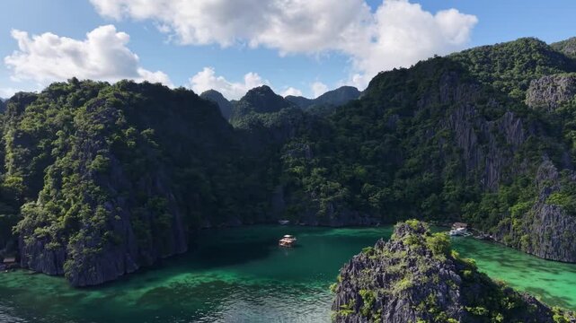 Aerial View of Tropical Island with Turquoise Coral Reef and Karst Mountains in Coron Palawan Philippines