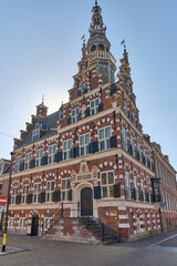 Fototapeta premium Historical renaissance architecture of Stadshuis Franeker a landmark building in Franeker Friesland Nederland for tourism and travel The ornate facade features intricate