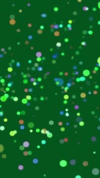 Animation of glowing light spots over green background