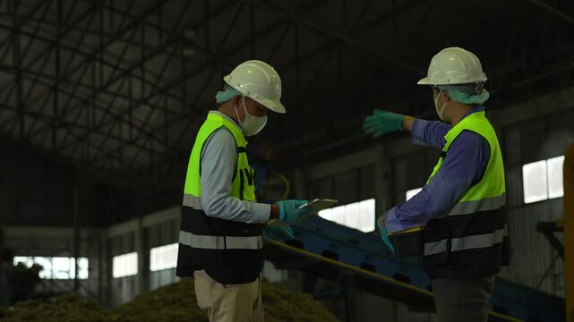 Engineers inspect municipal solid waste for quality and conversion into renewable energy, highlighting recycling, sustainability, clean power, and circular economy solutions.