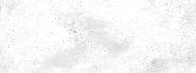 Naklejka premium Textured white surface with subtle grey speckles and noise during bright overhead lighting