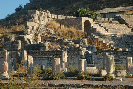 Ruins of the ancient Roman Odeon amphitheater with historic basilica columns in the archaeological site of Ephesus, Turkey.