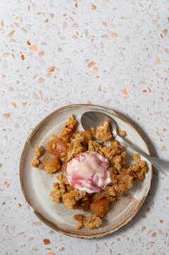 Close up of apple oat crumble with ice cream