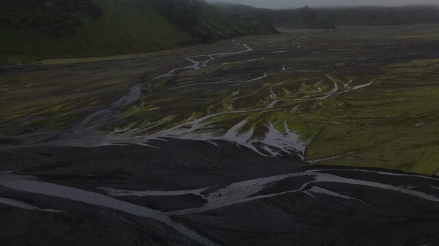 Aerial Drone View of Braided Glacial River Channels on Black Volcanic Sandur Plains, Iceland