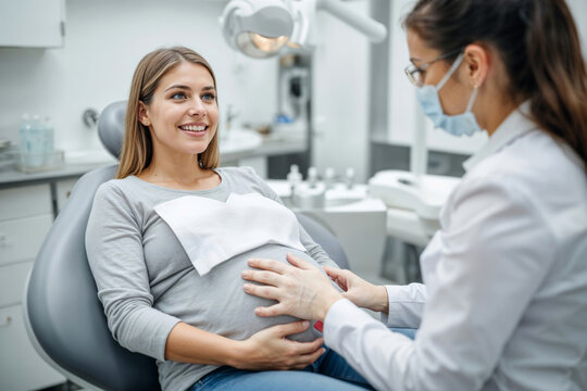 Expecting mother cares for oral health during pregnancy visit
