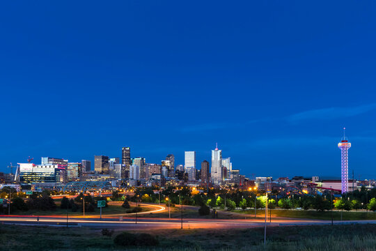 USA, Colorado, Denver, Cityscape and Interstate Highway in the evening