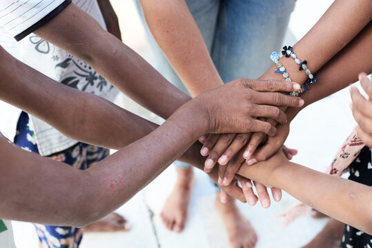 Group of multiethnic people, hands, together