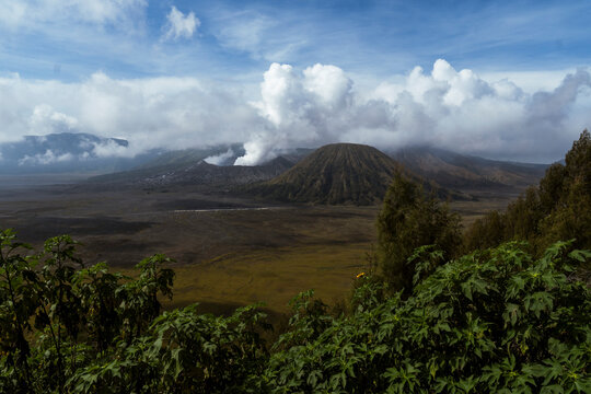 Scenic view of Mount Bromo volcano with smoking crater in Java Indonesia