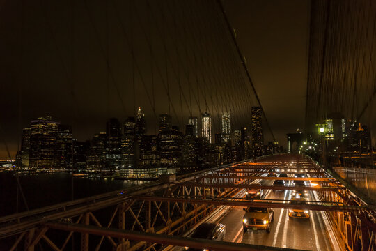 USA, New York City, traffic on bridge at night
