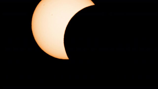 moment of totality during the 2026 solar eclipse when the moon cast a shadow over the sun 