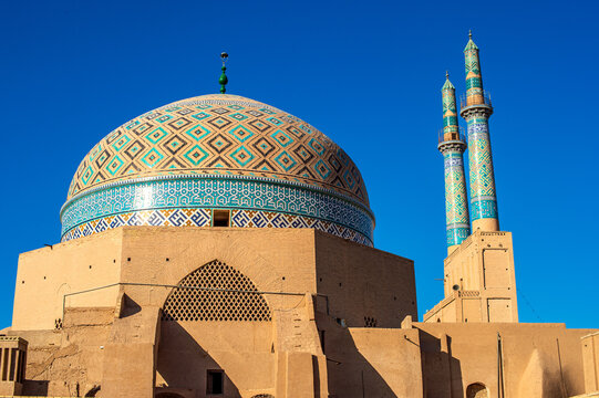  Stunning mosaic dome and twin minarets of Jameh Mosque in Yazd, Iran