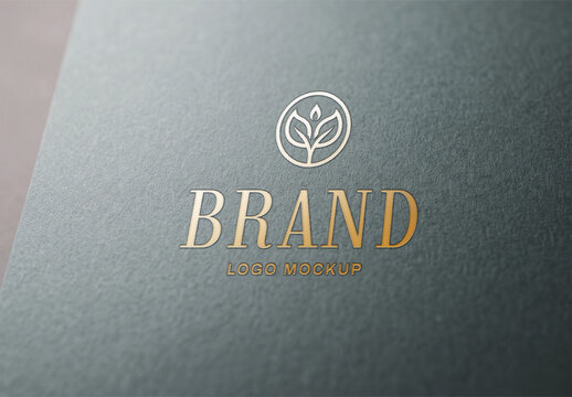 Luxury Gold Foil Logo Mockup on Dark Textured Paper Surface