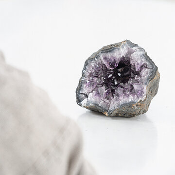 Natural Raw Purple Amethyst Geode Mineral Specimen Isolated on Bright White Background
