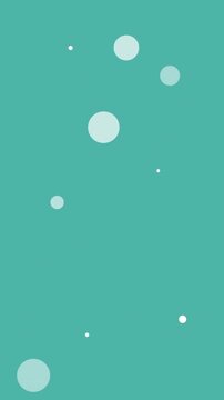 Animation of white spots falling on green background