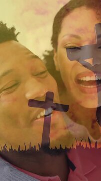 Embracing couple with cross and sunset animation in background