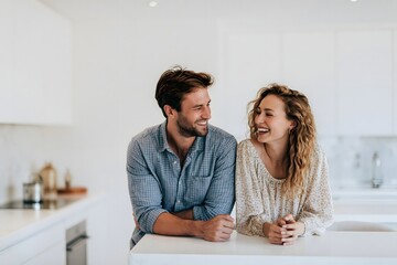 Fototapeta premium Smiling husband and wife celebrating family mortgage loan approval or real estate property purchase contract