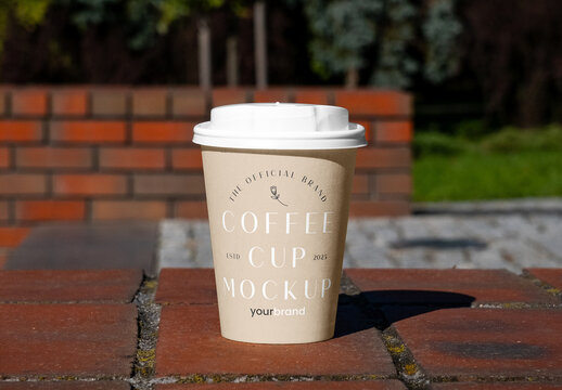 Paper Cup on Low Wall Mockup