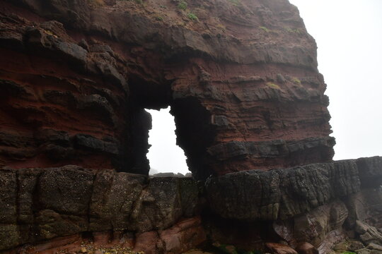 Cave in the cliff, Dunmore East Cliff Walk, Co. Wexford, Ireland
