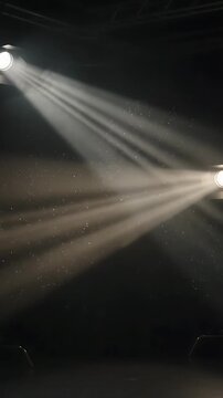 Stage Lights Beams Dynamically Sweeping Across a Dark Stage, Creating a Dramatic and Immersive Visual Effect. with Light Beams