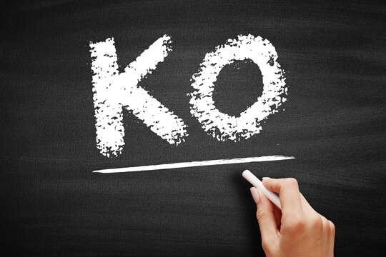 KO stands for Knockout, a fight-ending winning criterion in full-contact combat sports, presented as a hand-written chalk acronym on a traditional dark chalkboard