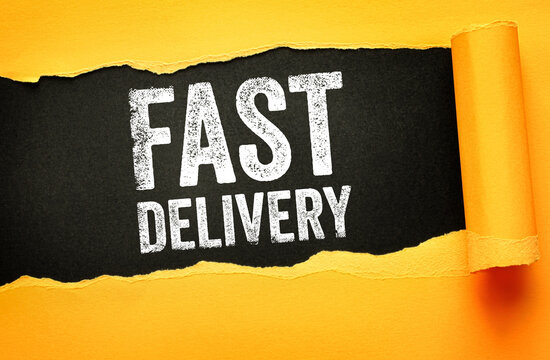 FAST DELIVERY text. Bold grunge typography revealed beneath a ripped surface, symbolizing express shipping, quick service, logistics speed, efficient courier, and timely transport