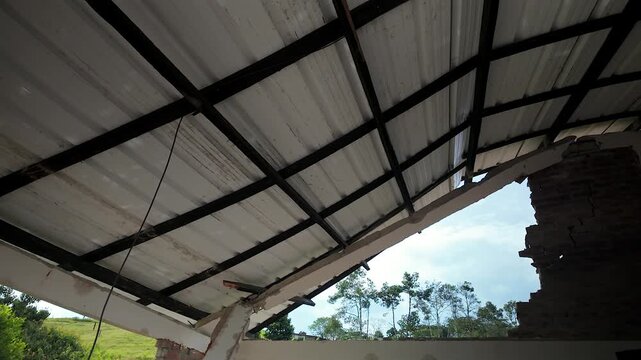 damaged roof and broken pillars after colombia earthquake