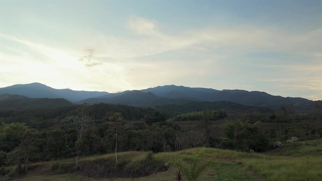 panoramic sunset view of mountains and lush valley in colombia