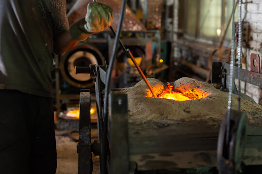 Foundry - ferrous metal is melted in an induction furnace of metallurgical plant