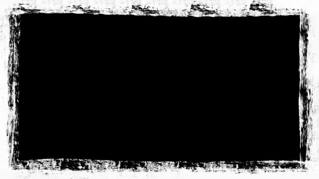 Abstract black and white grunge border frame overlay motion video. Dry brush stroke frame with scratches and paint splatters loop animation for urban video production.