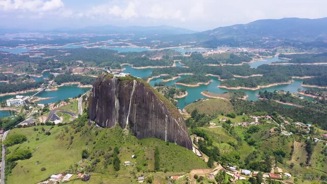 Aerial View of the Piedra del Penol Monolith in Guatap&eacute;, Colombia: A Stunning Landscape of a Massive Rock Formation Surrounded by the Intricate Labyrinth of the Embalse del Penol Reservoir