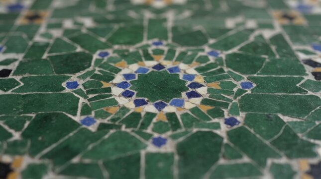 Generated with AI. Close up view of green and blue zellige mosaic tile with Moroccan geometric motif.
