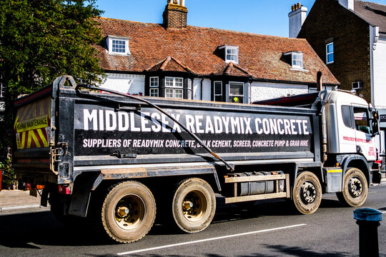 Close Up Of A Middlesex Readymix Concrete 12-Wheel Tipper Truck On A Public Road