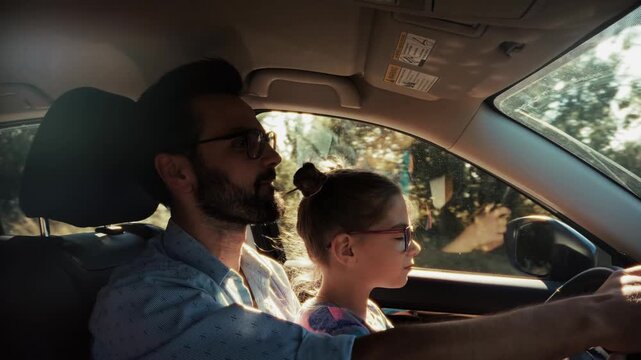 Driver Violating Traffic Safety Rules By Sitting Child In Front Passenger Seat Inside Automobile 