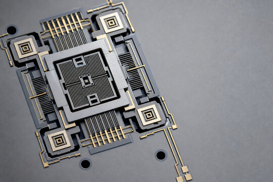 Microscopic MEMS sensor structure in extreme macro illustrating miniaturization and precision microengineering technology