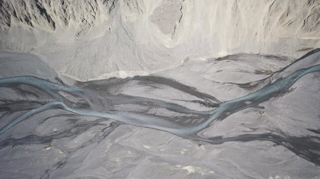 Top-Down Aerial View of Kuitun Riverbed Textures at Dushanzi Grand Canyon in Xinjiang: Water Erosion Gullies, Mudstone Strata and Earth Art