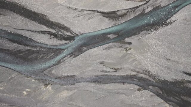 Top-Down Aerial View of Kuitun Riverbed Textures at Dushanzi Grand Canyon in Xinjiang: Water Erosion Gullies, Mudstone Strata and Earth Art
