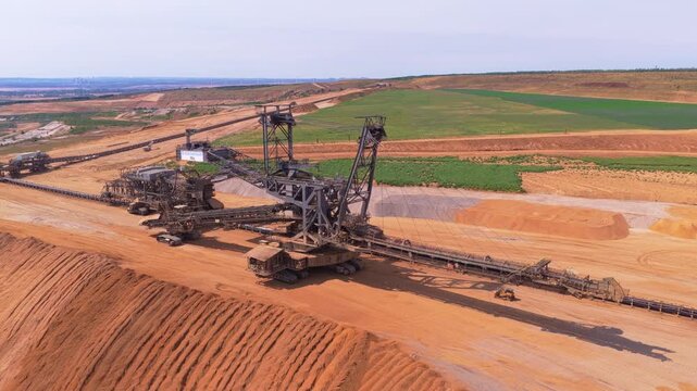 Giant bucket wheel excavator in german open pit mine