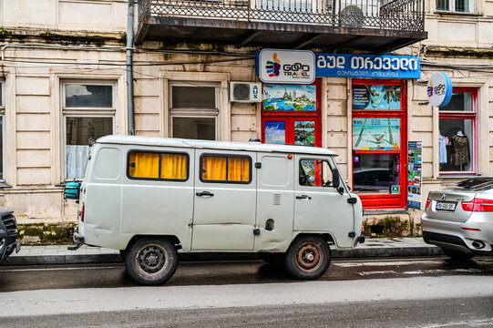 A gray UAZ-452 &ldquo;Buchanka&rdquo; van is parked in downtown Kutaisi; a classic Soviet minibus on the road, Imereti, Georgia 5.4.25